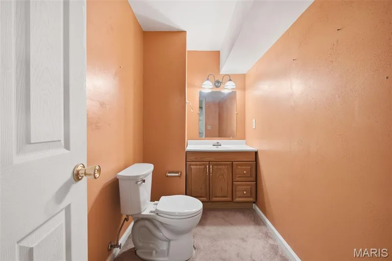 Lower level half bath — 1615 Wainscott Court, O'Fallon, MO 63366