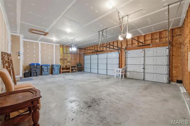 Three car garage with two garage door openers. — 1615 Wainscott Court, O'Fallon, MO 63366