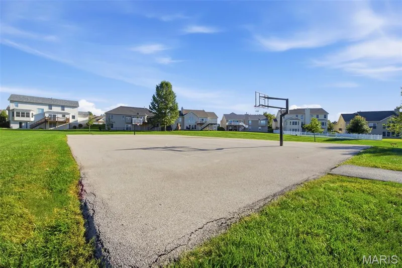 Sports court with basketball hoops. — 1615 Wainscott Court, O'Fallon, MO 63366