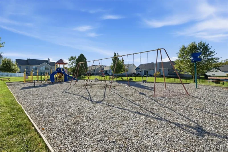 Neighborhood playground adjacent to the sports court and within walking distance of the home. — 1615 Wainscott Court, O'Fallon, MO 63366