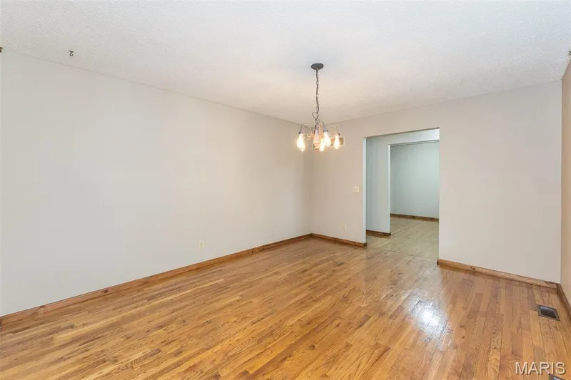 This space was used as a dining room — 357 Beaver Lake Drive, St Charles, MO 63303