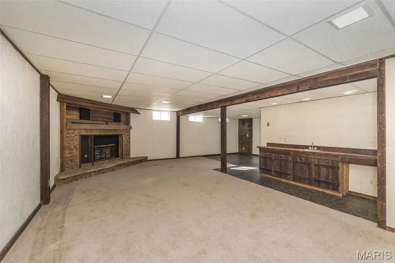 Wet bar and cozy fireplace — 357 Beaver Lake Drive, St Charles, MO 63303