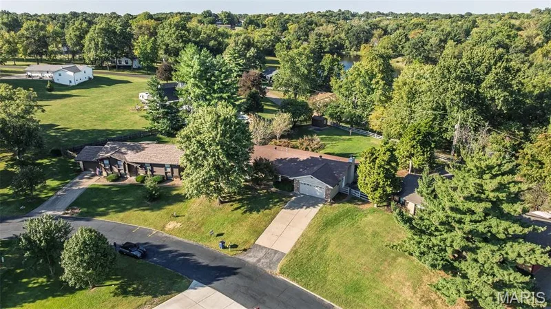 Peep the lake past the trees in the back — 357 Beaver Lake Drive, St Charles, MO 63303