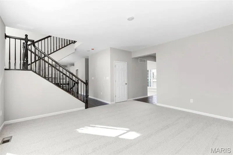 View of carpeted spare room — 2 Hermitage II at Elm Crossing, St Charles, MO 63301