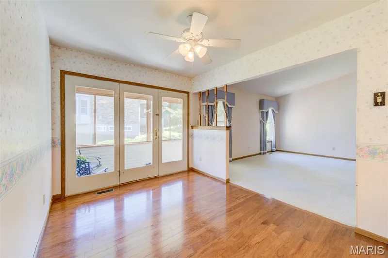 The atrium door leads to the enclosed porch/sunroom. — 2902 Oakmont Drive #18B, St Charles, MO 63301