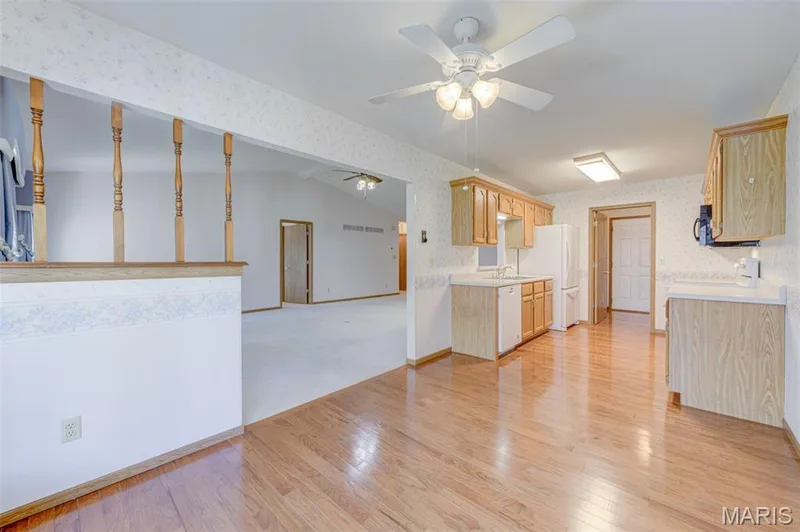 Kitchen and Breakfast Room feature hardwood flooring — 2902 Oakmont Drive #18B, St Charles, MO 63301