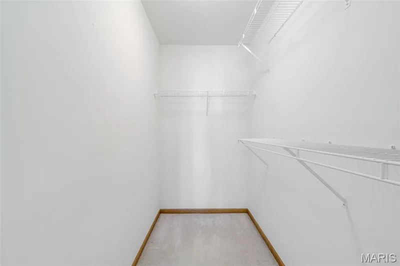 Walk In Closet at the Primary Bedroom Ensuite — 2902 Oakmont Drive #18B, St Charles, MO 63301