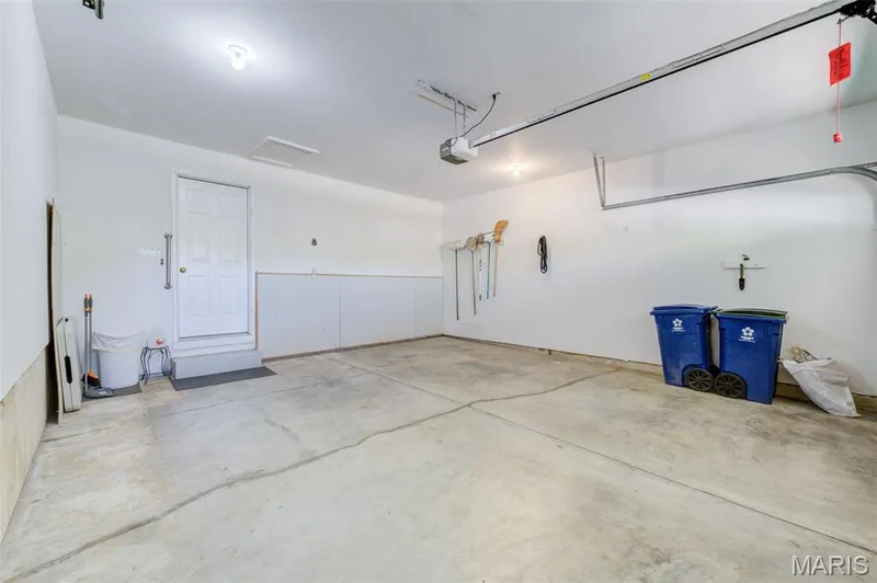 2 Car Garage is fully insulated and drywalled — 2902 Oakmont Drive #18B, St Charles, MO 63301