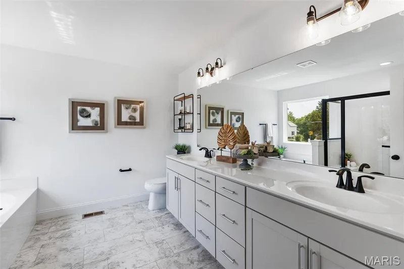 Full bathroom with separate shower and tub, vanity, and toilet — 2 Nottingham at Elm Crossing, St Charles, MO 63301