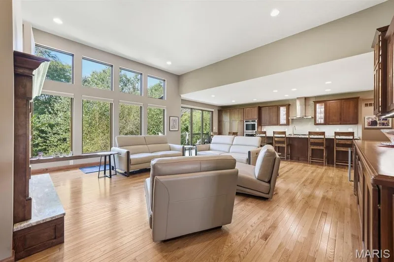 Open floor plan with built with floor to ceiling windows — 117 Trail Creek Court, St Charles, MO 63304
