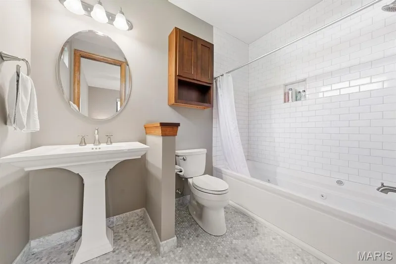 Full private bath for bedroom 3 with Kohler whirlpool tub — 117 Trail Creek Court, St Charles, MO 63304
