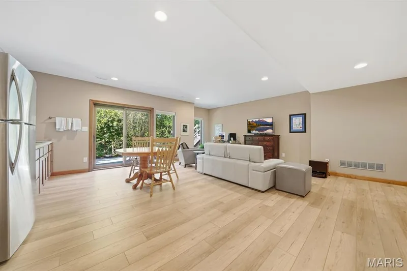 Lower level family room with room for media & entertaining — 117 Trail Creek Court, St Charles, MO 63304