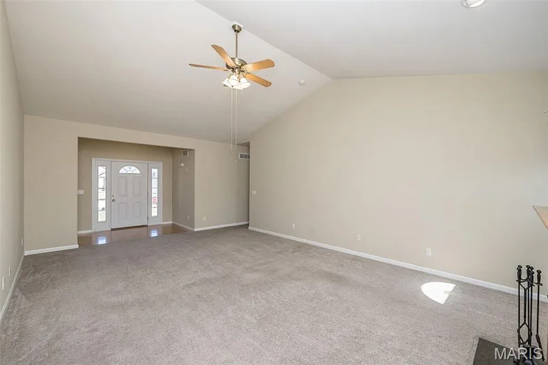 The opening to the right of the photo leads to the Bedroom wing on this level. — 84 Reuben Court, O'Fallon, MO 63376