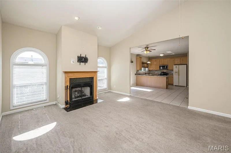 You can see the flow of the space to the grand kitchen, just ready for a crowd. — 84 Reuben Court, O'Fallon, MO 63376