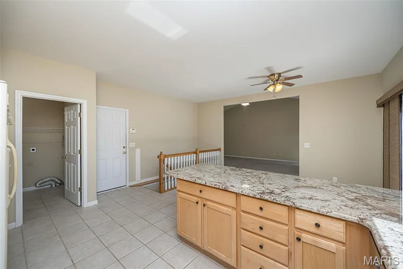Another photo illustrating the flow among these zones for entertaining. — 84 Reuben Court, O'Fallon, MO 63376