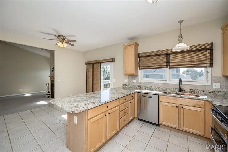 This home features a generous of windows for natural light on the terrace level, as well as the main level. — 84 Reuben Court, O'Fallon, MO 63376