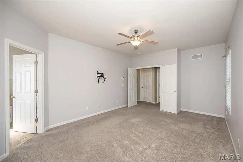 French doors lead to the Primary Suite. — 84 Reuben Court, O'Fallon, MO 63376