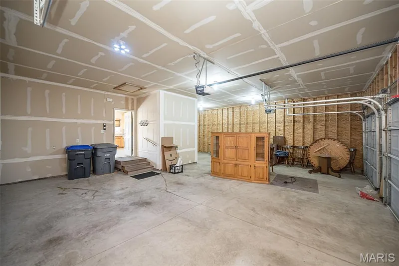 This is a view from the 2 Car Area of the 4 car garage. — 84 Reuben Court, O'Fallon, MO 63376