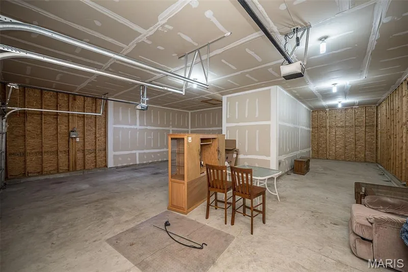 The third/Fourth bay of the Garage is 42 feet in dimension and amply room for 4 vehicles, a prized fishing boat or a multitude of toys. — 84 Reuben Court, O'Fallon, MO 63376