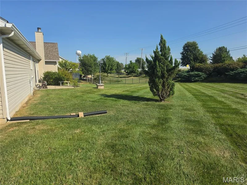 BEAUTIFUL FENCED BACK YARD — 1062 Highland Estates Drive, Wentzville, MO 63385