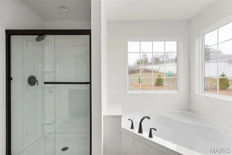 Bathroom with a healthy amount of sunlight and plus walk in shower — 2 Sequoia at Elm Crossing, St Charles, MO 63301