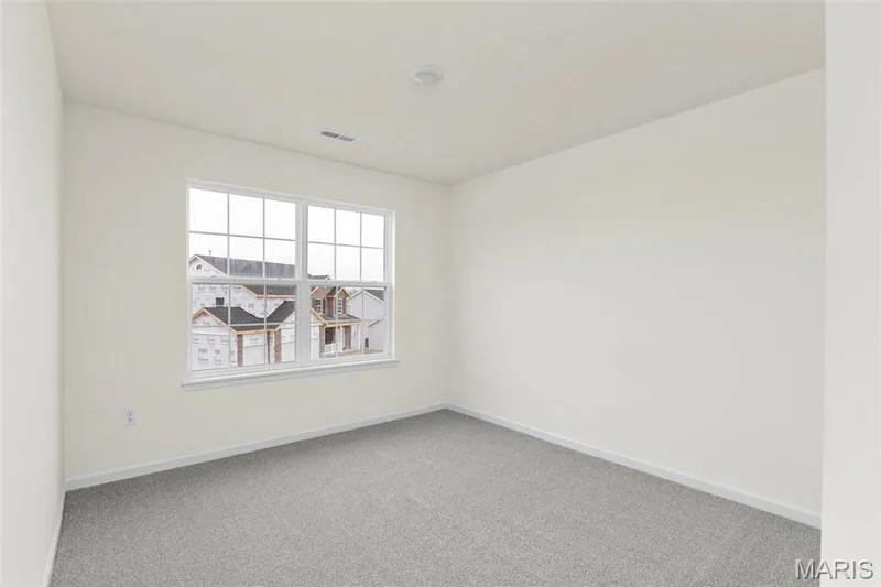 View of carpeted empty room — 2 Sequoia at Elm Crossing, St Charles, MO 63301