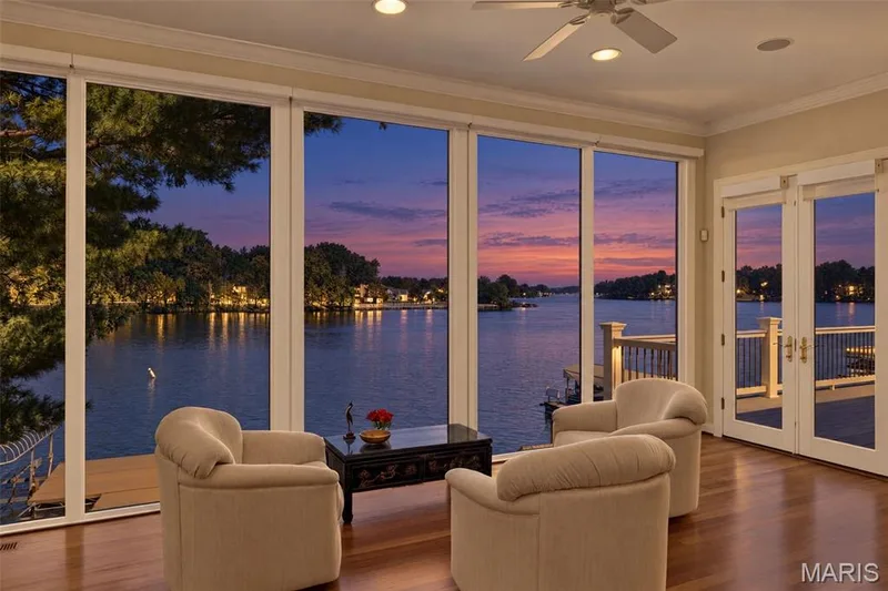 Wall of windows looking out over the lake — 33 Moorings Drive, Lake St. Louis, MO 63367