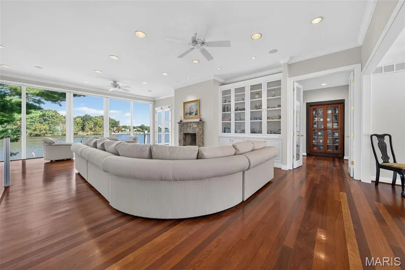 Great room with fireplace, hardwood floors, built ins — 33 Moorings Drive, Lake St. Louis, MO 63367