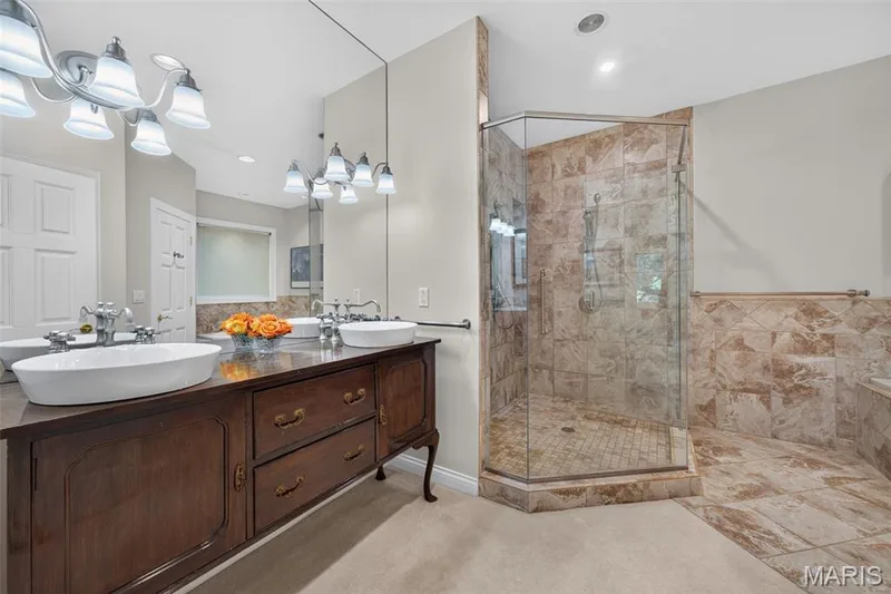 Double sink vanity, separate shower — 33 Moorings Drive, Lake St. Louis, MO 63367