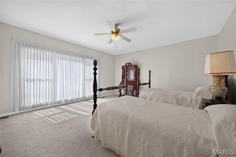 Secondary bedroom with ensuite bathroom — 33 Moorings Drive, Lake St. Louis, MO 63367