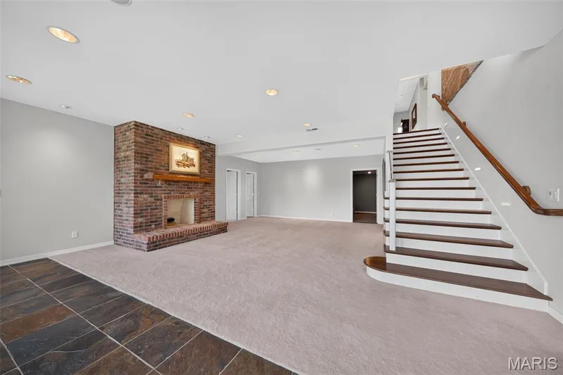LL Family room with gas fireplace — 33 Moorings Drive, Lake St. Louis, MO 63367