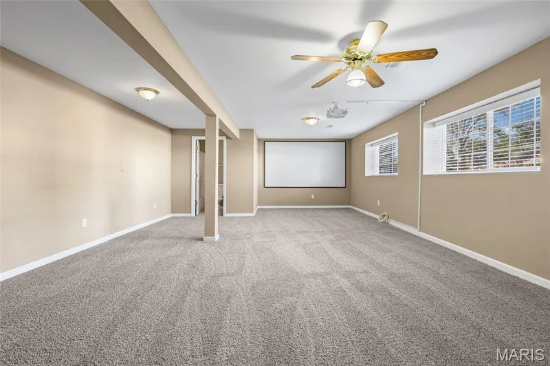 Spacious room featuring carpeting, ceiling fan, recessed lighting, and multiple windows — 2006 Chapel Hill Crossing, St Peters, MO 63376