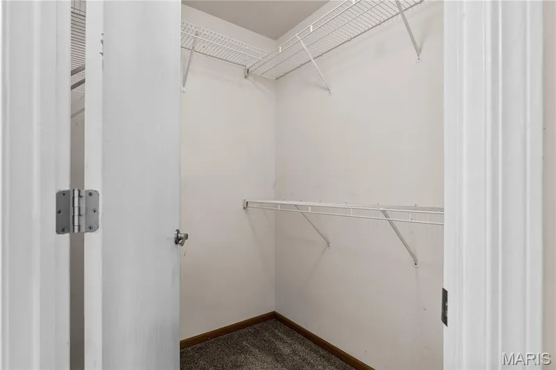 Primary bedroom walk-in closet — 2024 Belltower Drive, St Peters, MO 63376