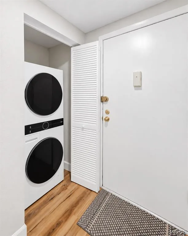 LG stacked washer/dryer unit in a dedicated closet — 1410 Heritage Landing #106, St Charles, MO 63303
