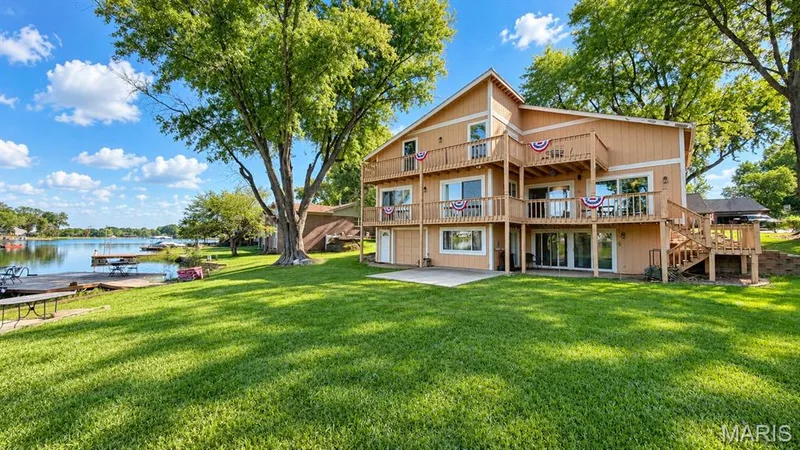 View of back of the home — 63 Champagne Drive, Lake St. Louis, MO 63367