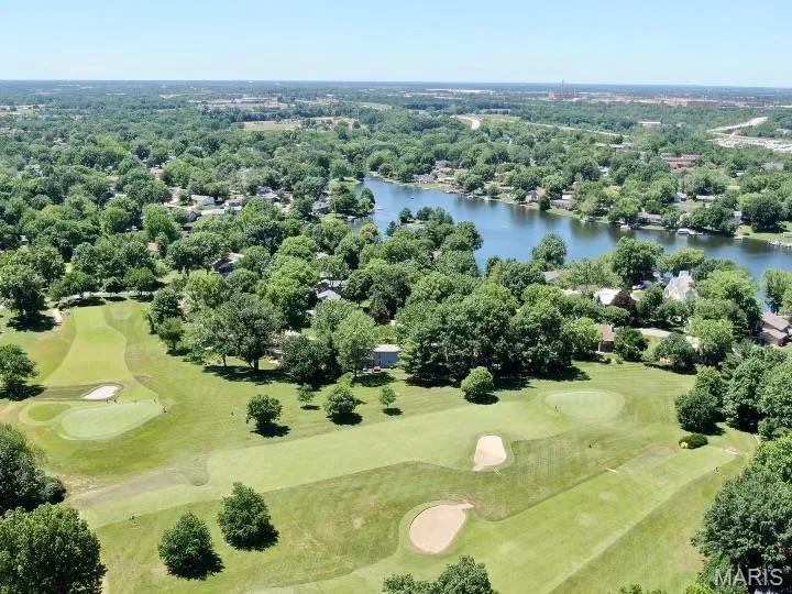 Aerial view of the 9 hole par 3 CA golf course — 63 Champagne Drive, Lake St. Louis, MO 63367