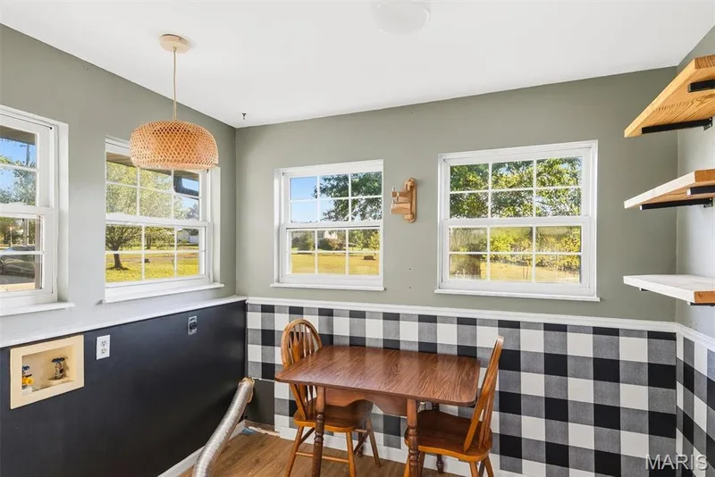 Multi-pane windows, wood-finish flooring, and built-in wall shelving — 10341 Rose Lane, Foristell, MO 63348