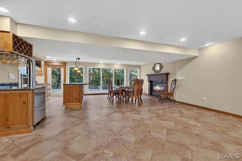 Wall of windows and door to the outside view and patio. — 2436 Indian Tree Run, Wildwood, MO 63038