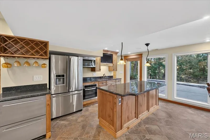 bar/kitchen in basement. — 2436 Indian Tree Run, Wildwood, MO 63038