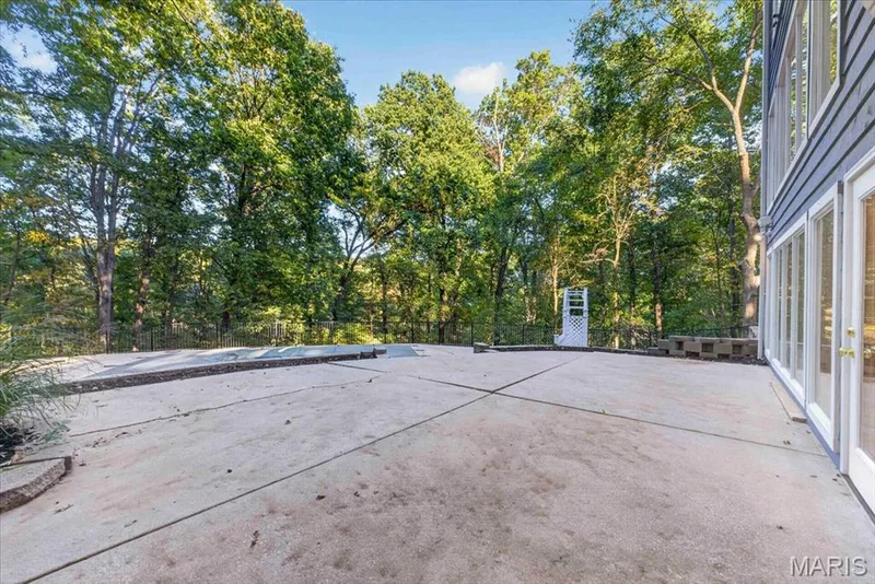 LARGE Upper patio off the back of the house, steps down to the pool. — 2436 Indian Tree Run, Wildwood, MO 63038