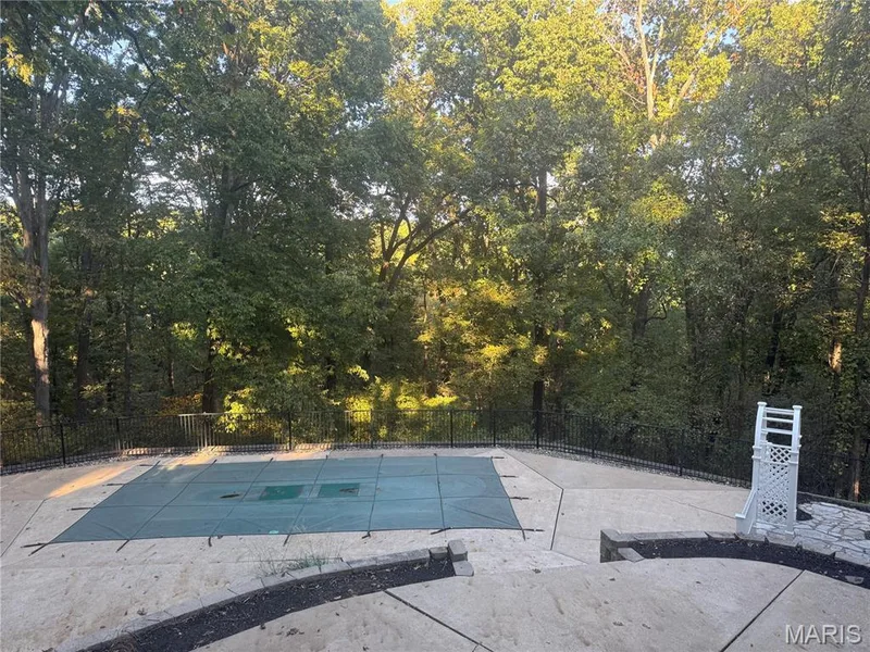 Upper and lower patio with pool. — 2436 Indian Tree Run, Wildwood, MO 63038