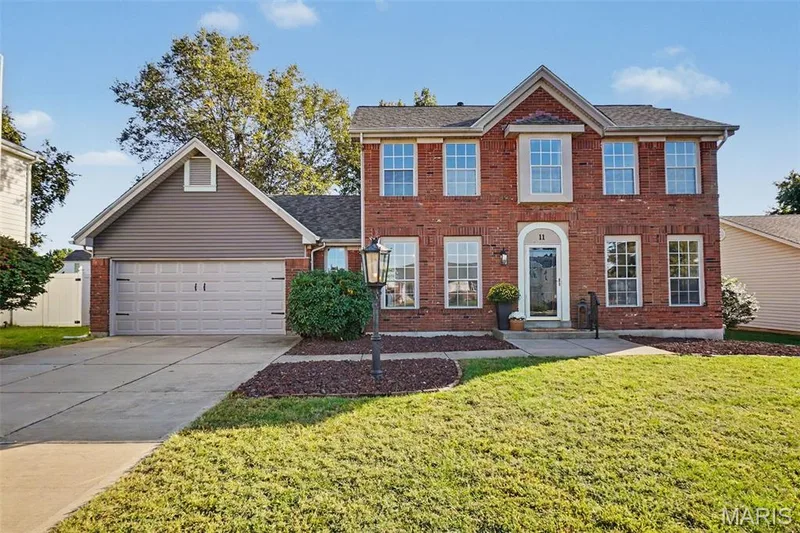 Brick exterior with white trim — 11 Castlio Court, St Charles, MO 63304