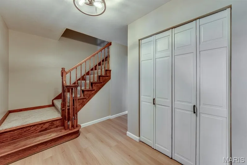 When the foyer steps are to the side, it helps to free up this space to welcome guests! — 3030 Woodlands, Wildwood, MO 63038