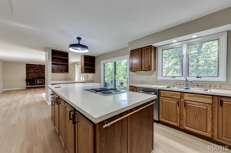 This space offers an open concept. — 3030 Woodlands, Wildwood, MO 63038