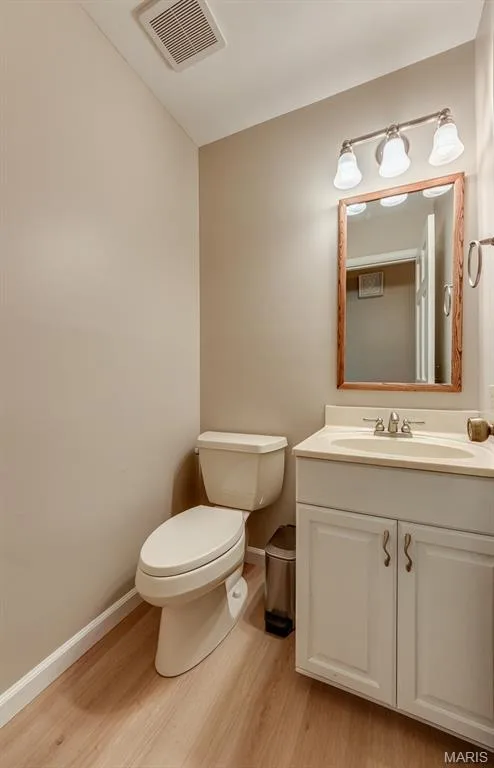As you'd expect, the main floor offers a half bath. — 3030 Woodlands, Wildwood, MO 63038