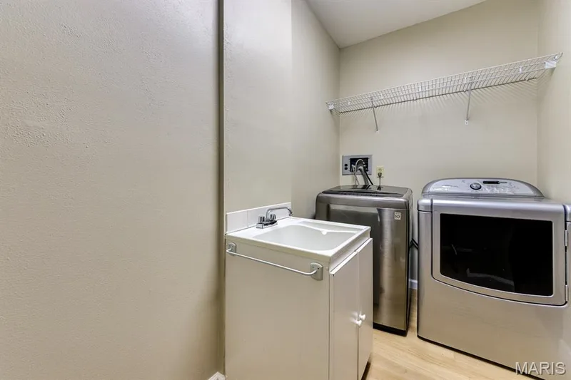 This laundry comes with washer and dryer included. — 3030 Woodlands, Wildwood, MO 63038