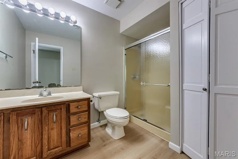 Master bath offers a linen closet for essentials. — 3030 Woodlands, Wildwood, MO 63038