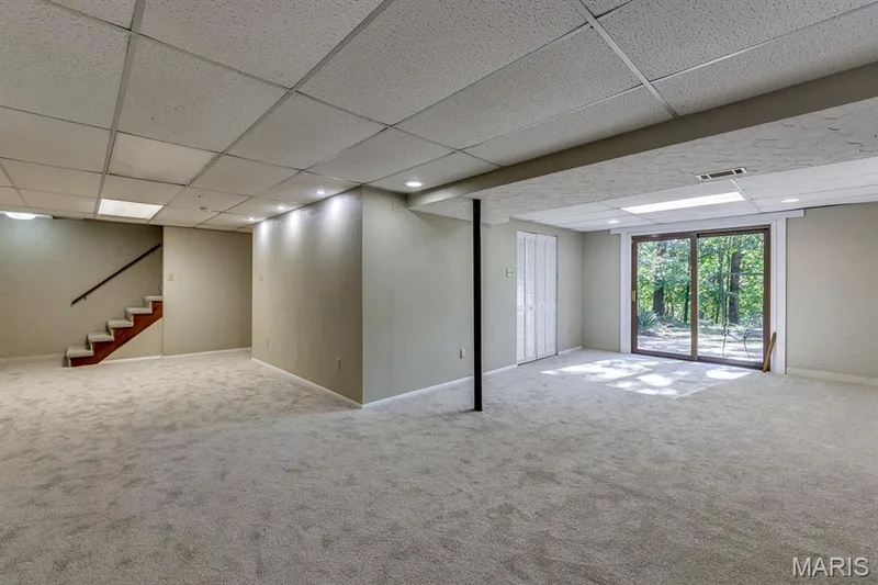 This basement is perfect for kids/entertaining, with great natural light and access to the back yard. — 3030 Woodlands, Wildwood, MO 63038