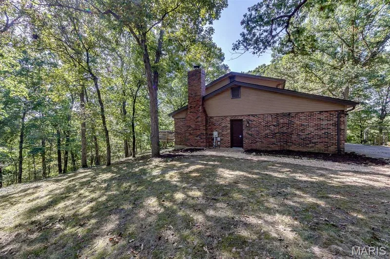 This home offers the convenience of a man door to the garage. — 3030 Woodlands, Wildwood, MO 63038