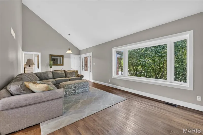 Expansive bay windows (2022) bring in plenty of natural light. — 15056 Isleview Drive, Chesterfield, MO 63017